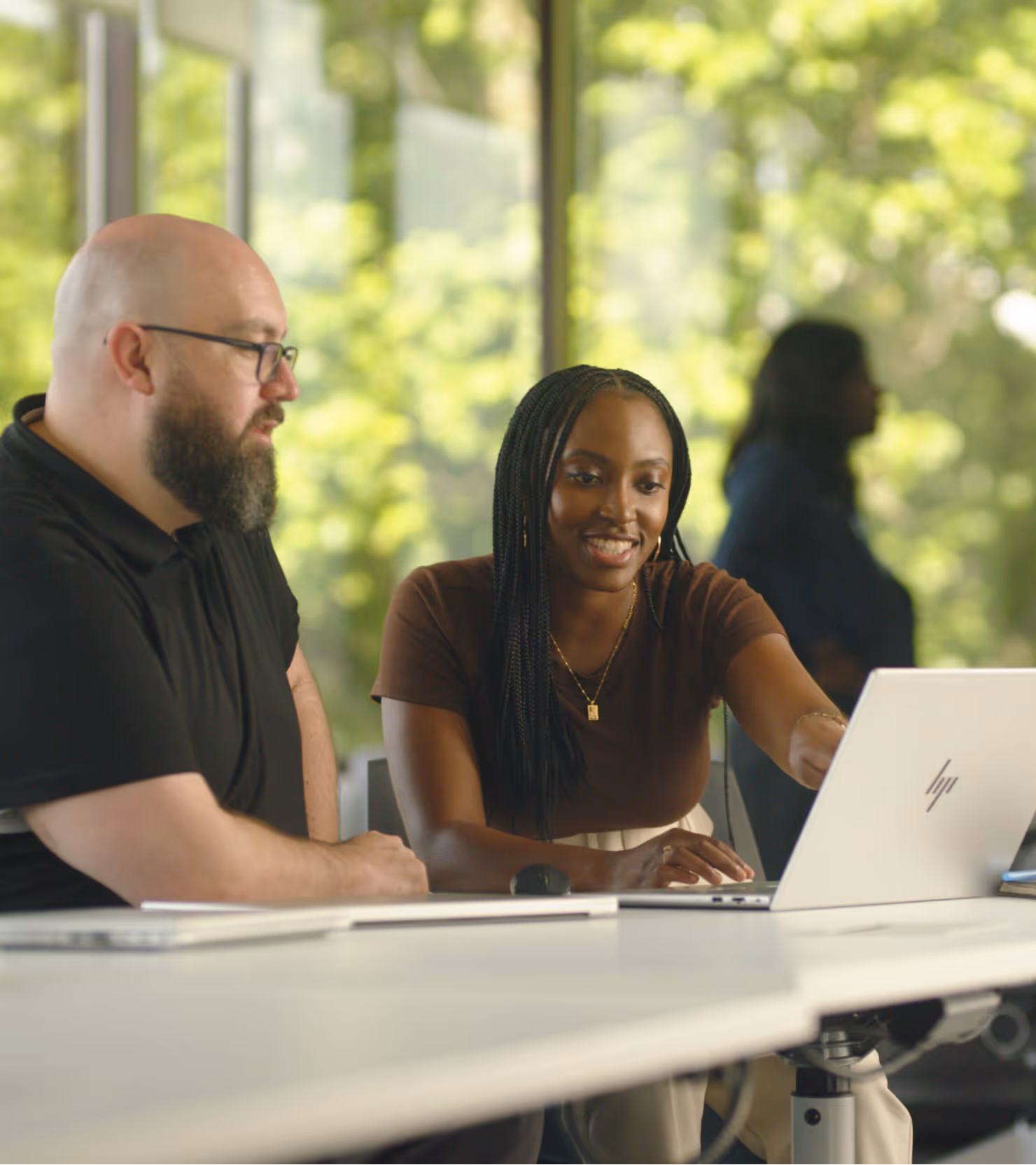 Founder reviewing launch progress with the Carril Agency team